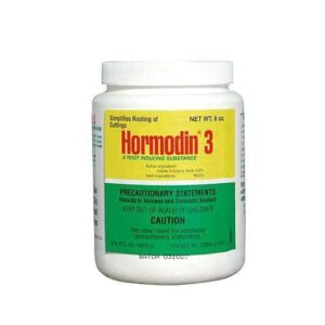 Container of hormodin 3 rooting hormone powder designed to simplify the rooting process of plant cuttings, with precautionary and handling instructions.